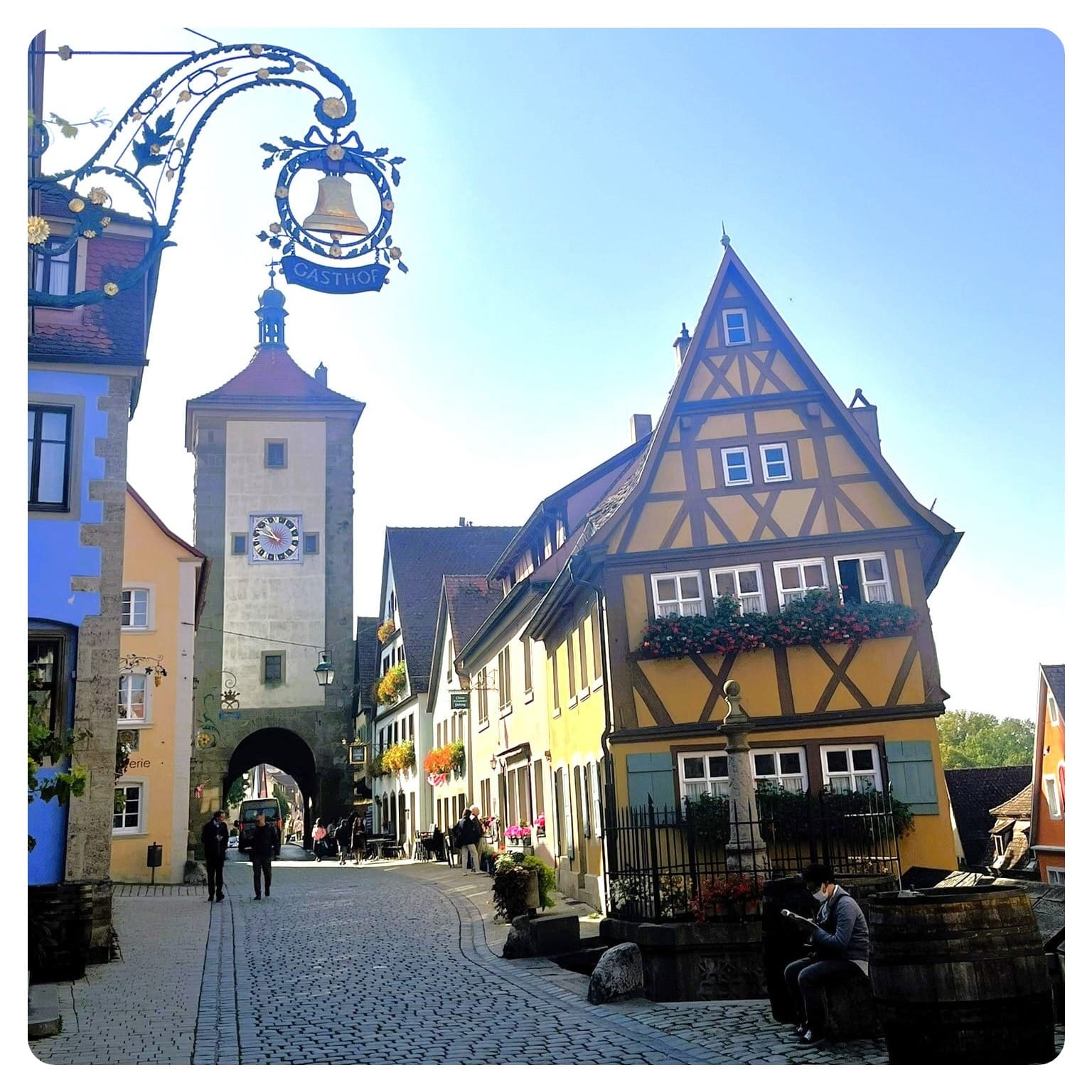 Yellow half-timered house and cobblestone street of the Plönlein in Germany