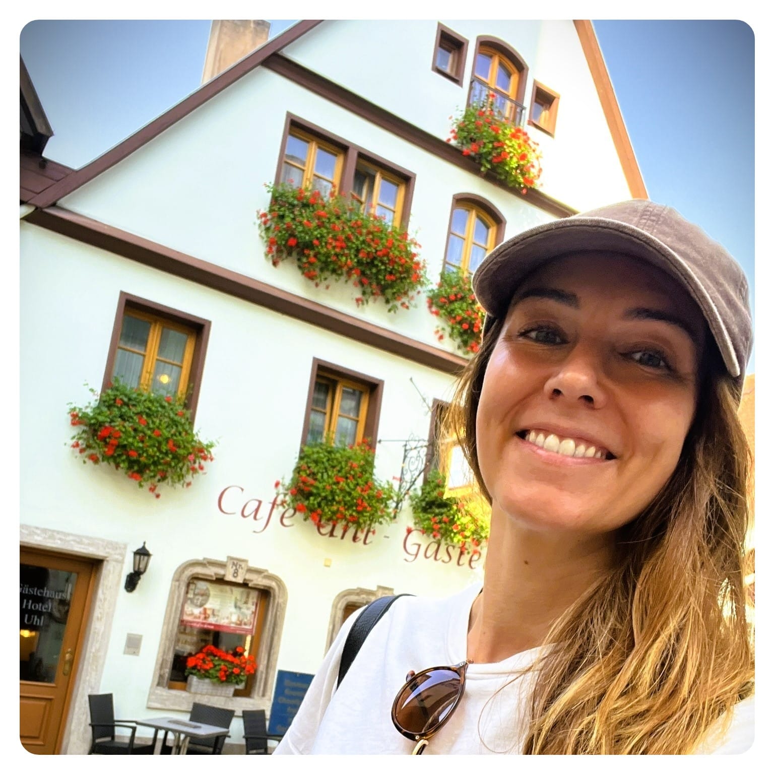vanlavita woman smiling in front of a half-timber frame house in Rothenburg ob der Tauber