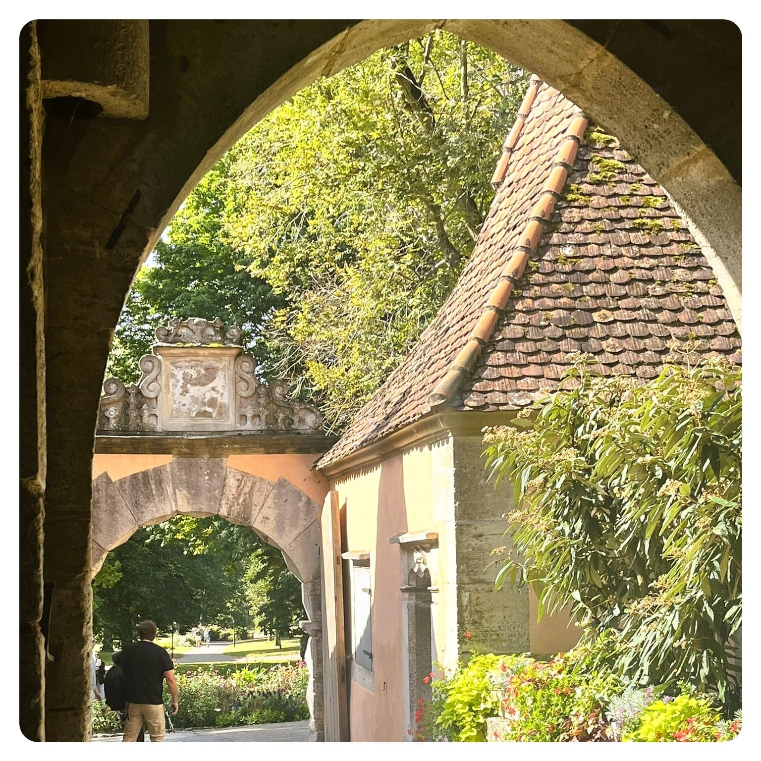 stone gatehouse leading to park