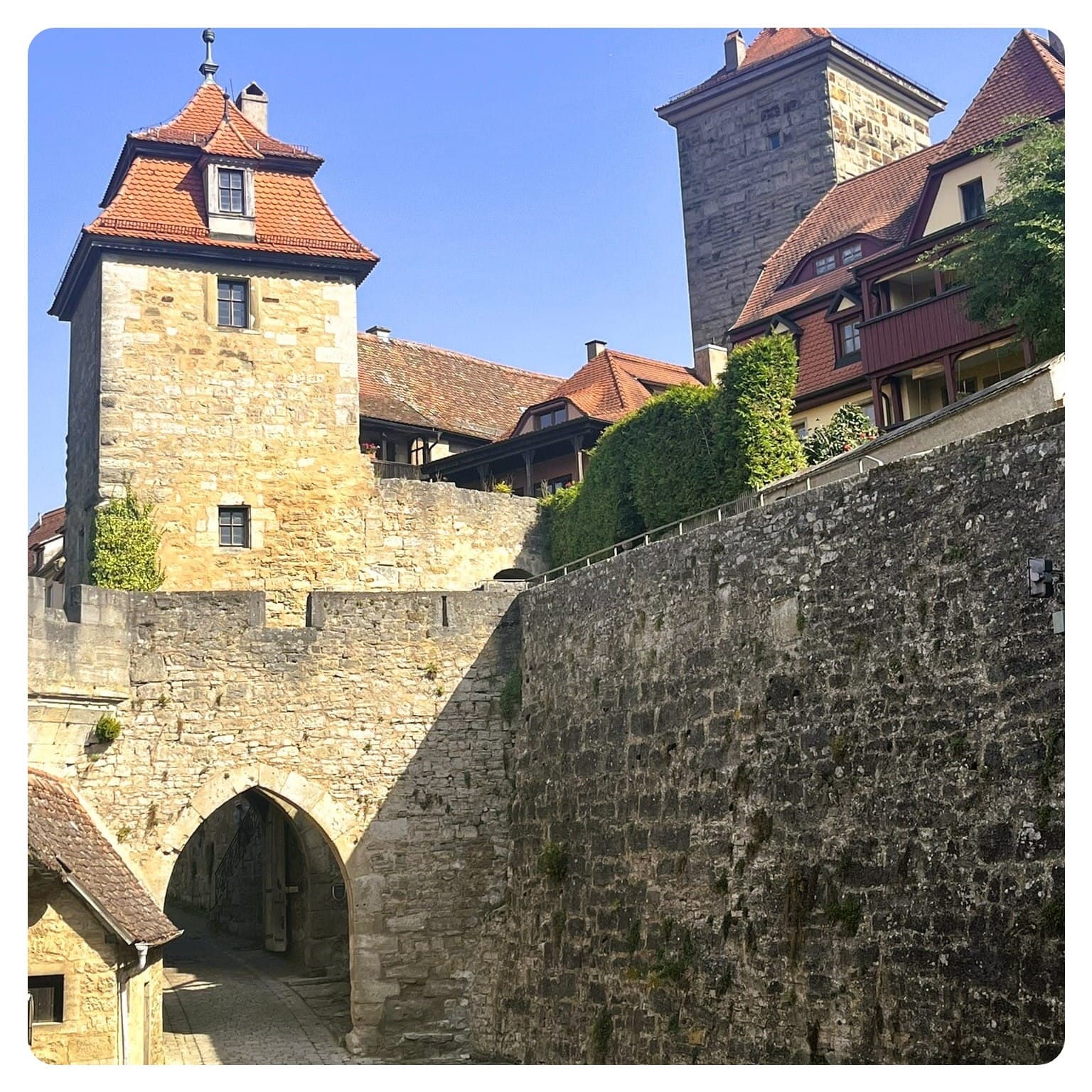 stone gatehouse and tower in city walls of Rothenburg